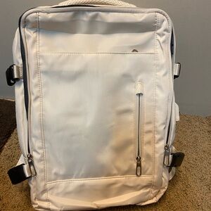 Sleek off white Backpack with usb charging capabilities